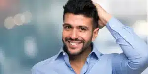 Man touching his hair